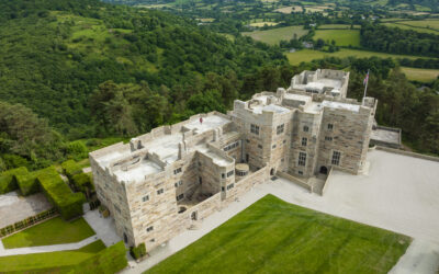 Aerial view over Castle. Dartmoor is in the background